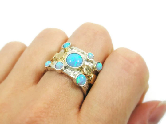 Sterling silver and gold opal ring