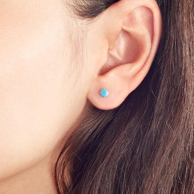 gold 4mm stud earrings with blue stone