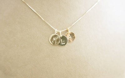 Triple initial gold charms